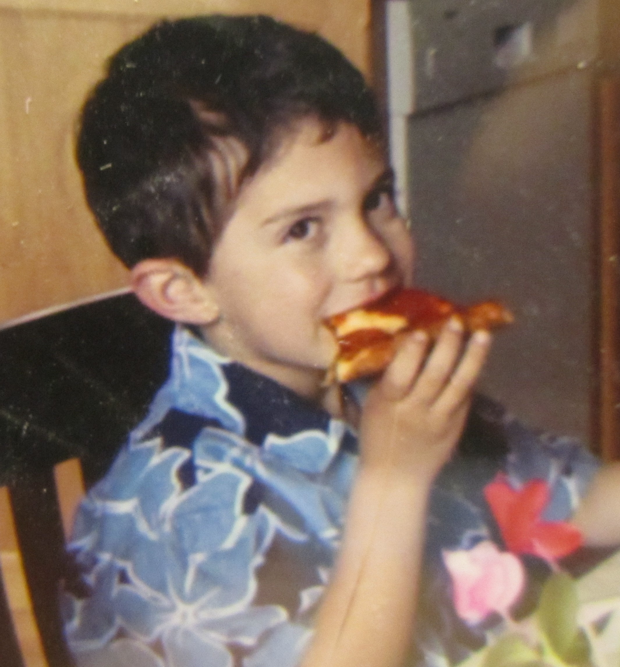 A picture of me enjoying pizza